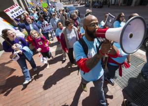 Protestors in Indiana march against the Religious Freedom Restoration Act.