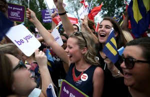 Same-sex marriage supporters rejoice outside the Supreme Court in Washington, D.C. on Friday after the U.S. Supreme Court handed down a ruling regarding same-sex marriage.  The high court ruled that same-sex couples have the right to marry in all 50 states. (Alex Wong/Getty Images)