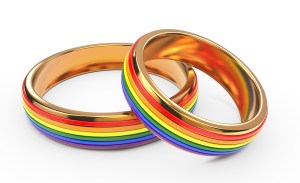 Gay Marriage Concept with Rainbow Rings.